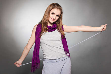 Portrait of young smiling girl lace strengtheningの写真素材