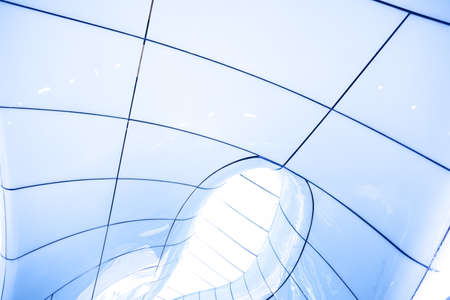 Modern abstract ceiling in blue horizontal viewの写真素材