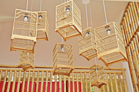 Unique hanging lamp shade from birdcageの写真素材