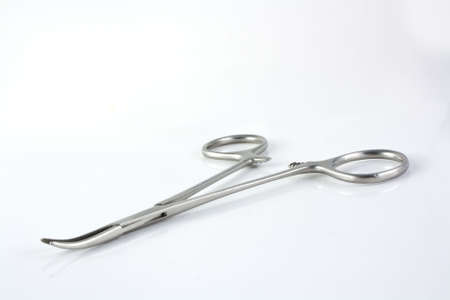 Surgical medical clamp over white backgroundの写真素材