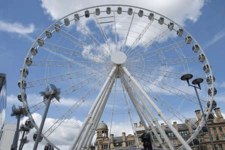 A Fairground Wheel on a city shopping plazaのeditorial素材