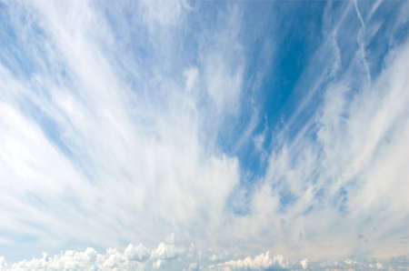 Cirrus or Mares Tails Clouds with Cumulus Clouds in backgroundの写真素材