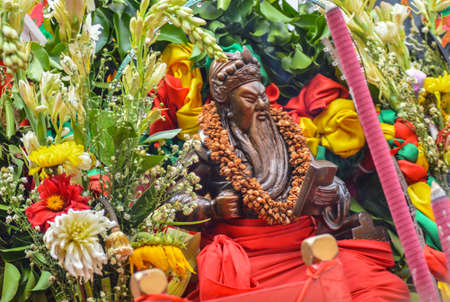 Statue of chinese goddes is paraded on the street of new year chinese celebrationの写真素材
