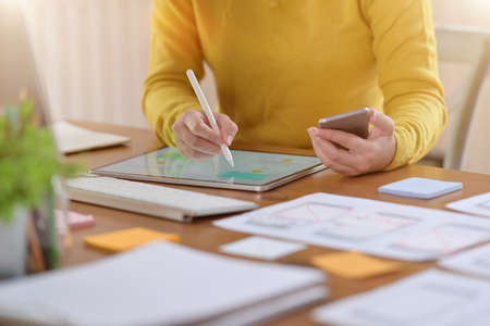 UI website creative designer designing template framework for mobile phone layout on mockupの写真素材
