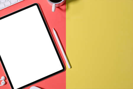 Office colourful desk working space and mockup tablet