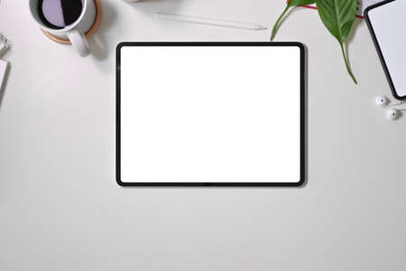 Top view digital display graphics tablet on white workspace desk tableの写真素材