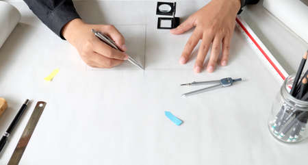 Architecture drawing on desk office. Top view shot