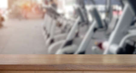 Empty wood table space platform and fitness gym background