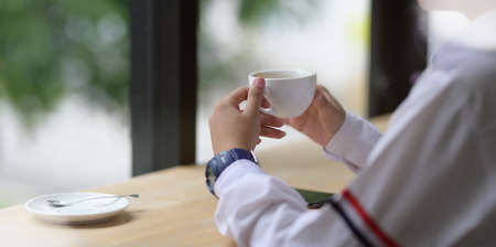 Business woman drinking coffee in relaxing time at coffee shopの写真素材
