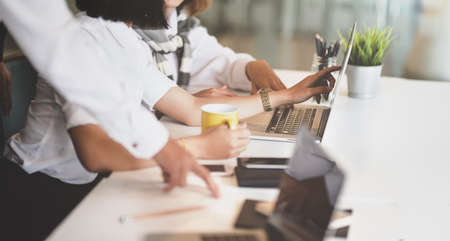 Cropped view of professional business team brainstorming the idea concepts for the project together