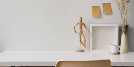 Minimal workplace with copy space and office suppliesの写真素材
