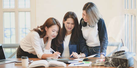 Professional startup team brainstorming the plan together with positive attitude in modern office roomの写真素材