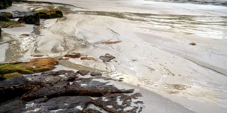 Beautiful tropical beach with rocks and clear white sand background.の写真素材