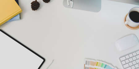 Top view of modern white workplace with copy space and others office supplies and blank screen...