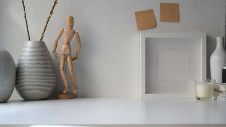 Photo frame mock up with ceramic vase, Scandinavian styleの写真素材