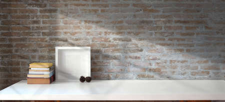 Mock up frame with copy space on white wooden table and vintage brick wall background の写真素材