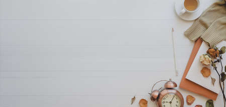 Top view of feminine vintage workspace with copy space and office suppliesの写真素材