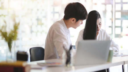 Close-up view of professional designer team working on their project in modern office roomの写真素材