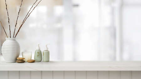 Close up view of ceramics shampoo, soap, vase and candle on top marble table with blurred bathroom interior Backgroundの写真素材