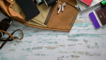 Top view of travel accessories, travel item prepared for the trip ready to be packed and copy space...