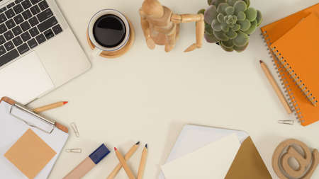 Top view of mock up scene creator with stationery, supplies, laptop, envelope, decorations and copy space on white tableの写真素材