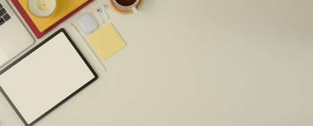 Top view of mock up scene creator with copy space, mock up tablet, stationery and coffee cup on...