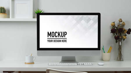 Close up view of computer desk with stationery and decorations in home office room, include clipping...