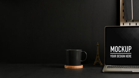 Close up view of worktable with laptop, cup and copy space in home office room, include clipping pathの写真素材