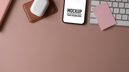 Top view of computer desk with smartphone, keyboard, card case and copy space, include clipping pathの写真素材