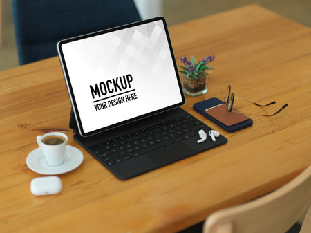 Top view of portable workspace with tablet, smartphone and accessories in co working spaceの写真素材