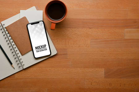Top view of study tablet with smartphone, stationery, coffee mug and copy space, clipping pathの写真素材