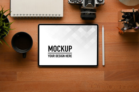 Top view of workspace with digital tablet include clipping path, stationery and camera in home officeの写真素材