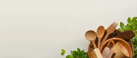 Zero waste concept, mock up scene with wooden kitchenware and copy space on white background, top...