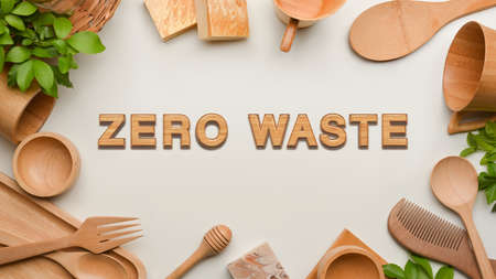 Zero waste concept, wooden kitchenware and copy space on white backgroundの写真素材