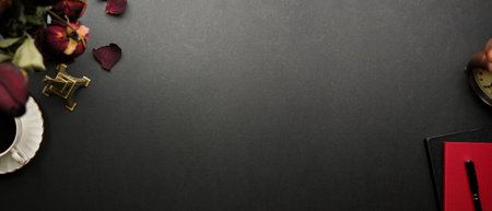 Top view of stylish flat lay workspace with stationery, coffee cup, dried roes and copy spaceの写真素材