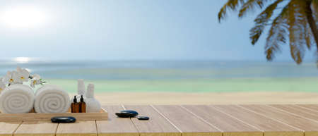Cropped shot of Spa accessories on wooden table and copy space with sea background, summer conceptの写真素材