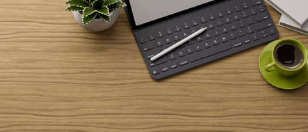Top view, wooden table with digital tablet, keyboard, stylus pen, cup, plant pot and copy space, 3D rendering, 3D illustrationの写真素材