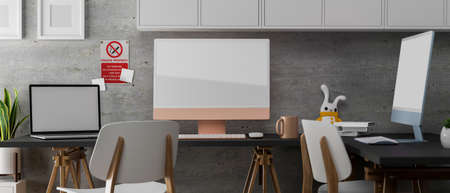 3D rendering, modern co-working space with computer devices, laptop, supplies, doll and plant pot decorated in the room, 3D illustrationの写真素材