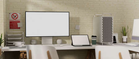 Comfortable workplace with computer, laptop, office supplies, decorations and no smoking sign on the wall, 3D rendering, 3D illustrationの写真素材