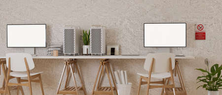 Minimal office desk with two computer devices,  supplies, decorations and no smoking sign on the wall, 3D rendering, 3D illustrationの写真素材