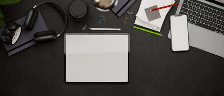 Top view, 3D rendering, dark creative flat lay workspace with tablet, laptop smartphone, accessories and supplies on black table, 3D illustrationの写真素材