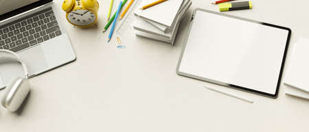 Top view, 3D rendering, minimal workspace with laptop, tablet, stationery, accessories and copy space on white background, 3D illustrationの写真素材