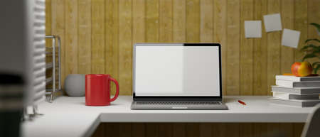 3D rendering, study table with laptop, stack of books, mug, stationery and supplies on the table with plank wall, 3D illustrationの写真素材