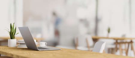 3D rendering, side view of workspace with laptop, supplies, plant pot and copy space on wooden desk, 3D illustrationの写真素材