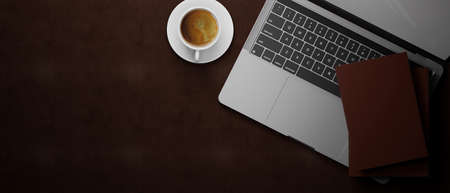 3D rendering, workspace with computer laptop, coffee cup, books and copy space on leather background, 3D illustrationの写真素材