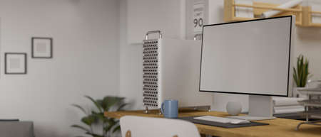3D rendering, computer with mock-up screen on wooden table with office supplies in working room, 3D illustrationの写真素材