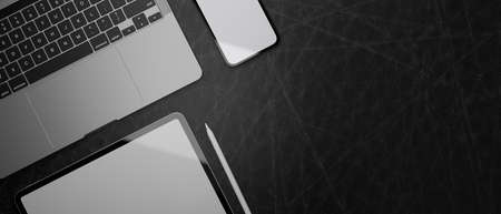 3D rendering, computer devices and smartphone with mock-up screen on black leather table with copy space, top view, 3D illustrationの写真素材