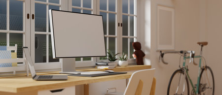 3D rendering, cozy home office interior design with computer desk beside the window, supplies, and bike in the room, 3D illustration, side viewの写真素材