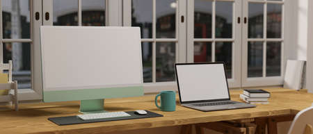 Comfortable workspace with computer, laptop and supplies the table beside the window, 3D rendering, 3D illustrationの写真素材
