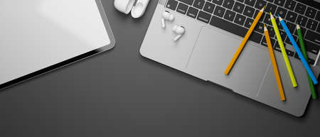 3D rendering, top view of working space with laptop, coloured pencils, tablet and accessories on grey background, 3D illustrationの写真素材